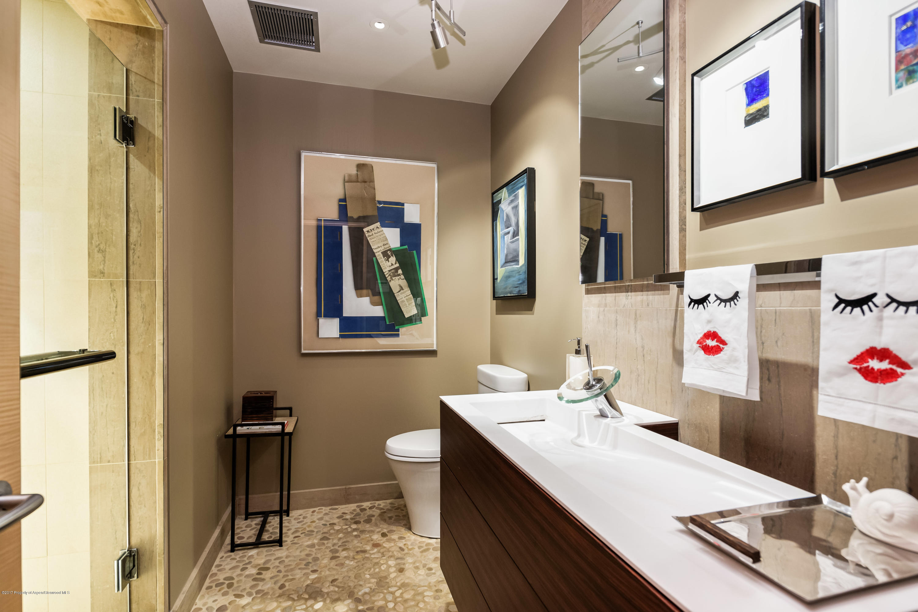 710 East Durant Avenue, Unit C & D Aspen, CO 81611 - Photo 16 of 23 a bathroom with a sink vanity and mirror