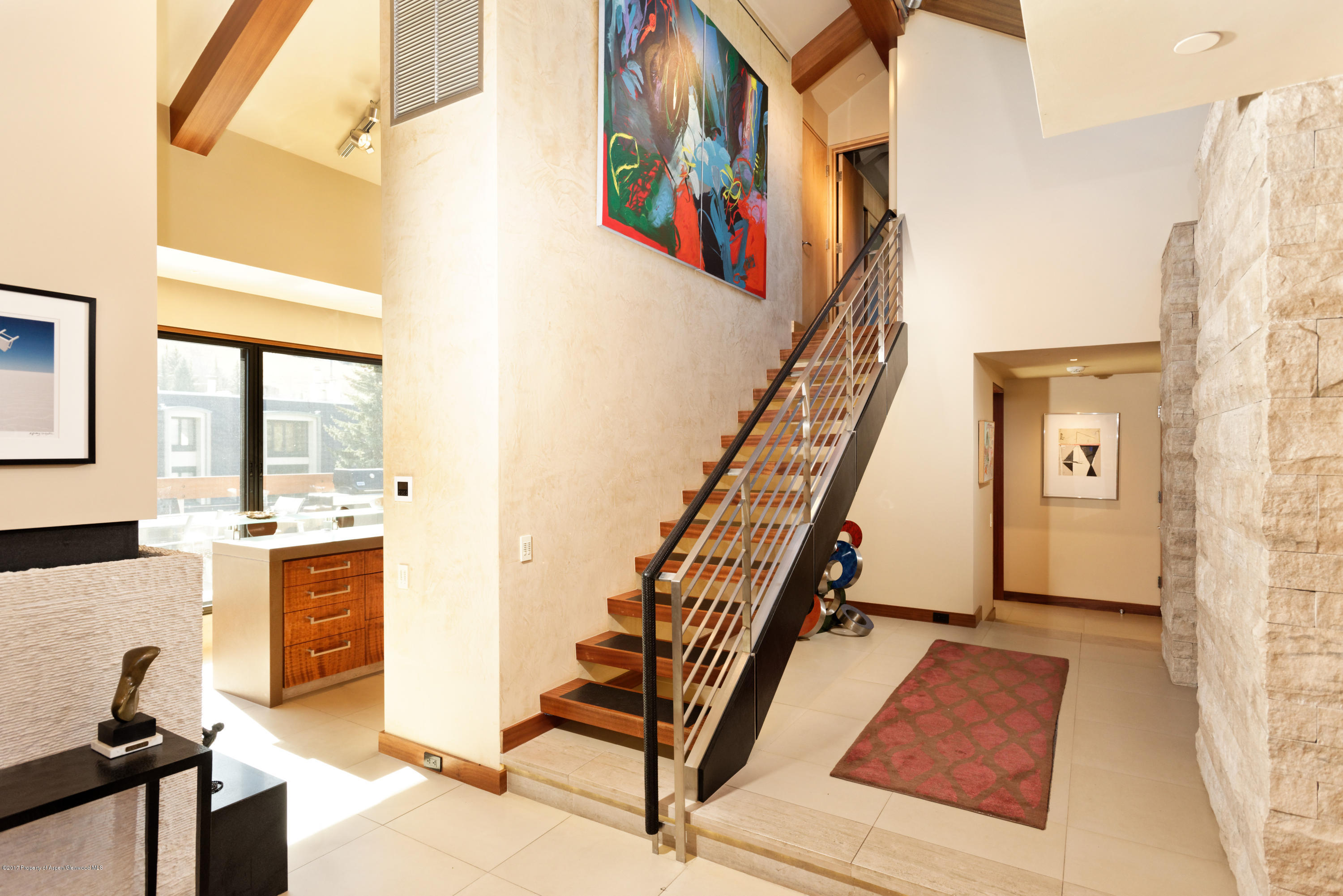 710 East Durant Avenue, Unit C & D Aspen, CO 81611 - Photo 18 of 23 a view of a livingroom with furniture and staircase