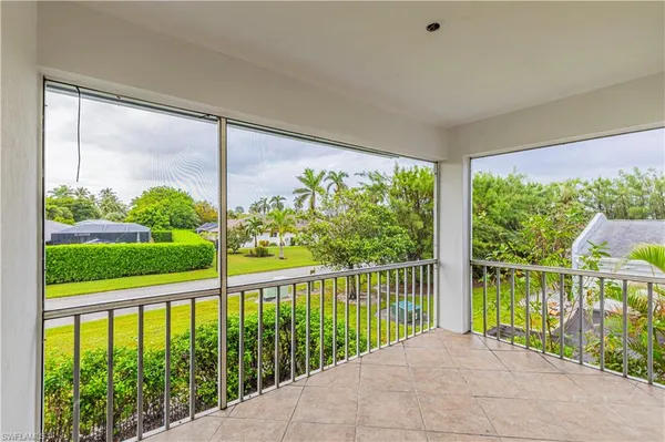 a view of a balcony with lake view