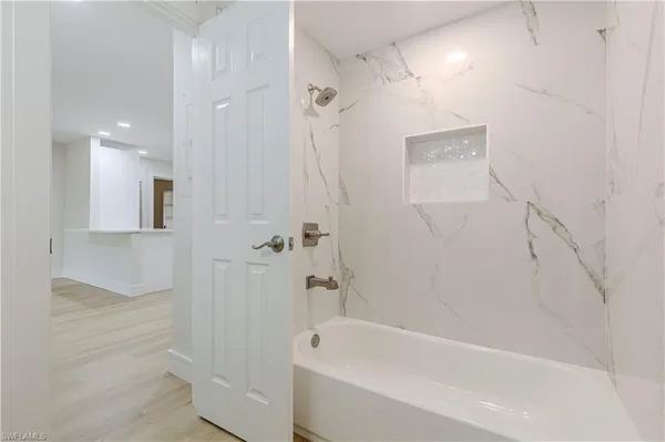 a bathroom with a bathtub