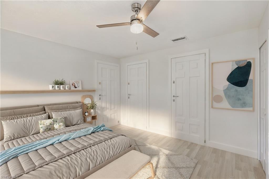 5 Watercolor Way, Unit 5 Naples, FL 34113 - Photo 10 of 13 a bedroom with a bed and a shower