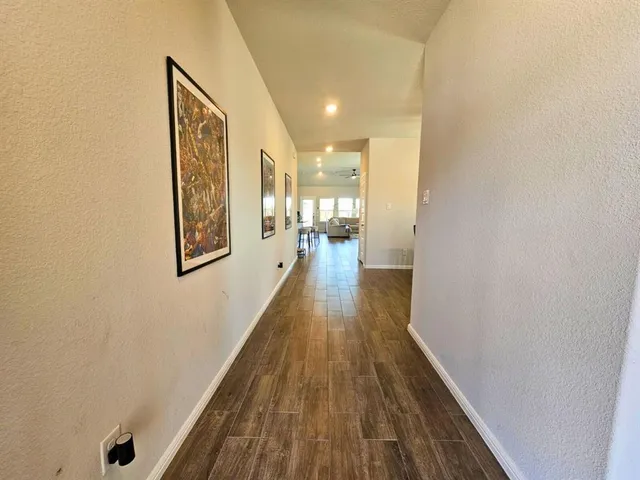 a room with furniture and a chandelier