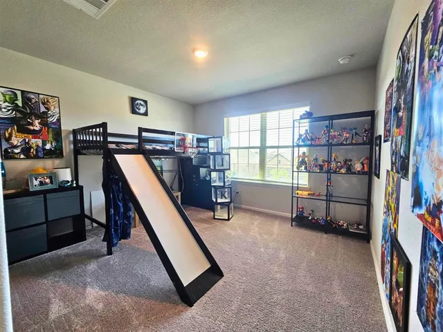 a view of a room with shelves