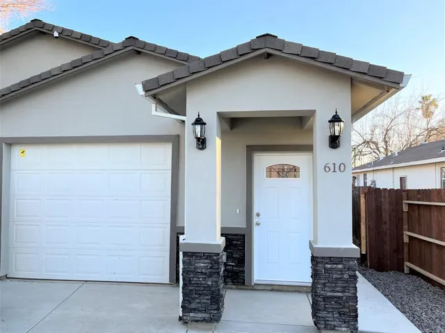 a front view of a house with glass door
