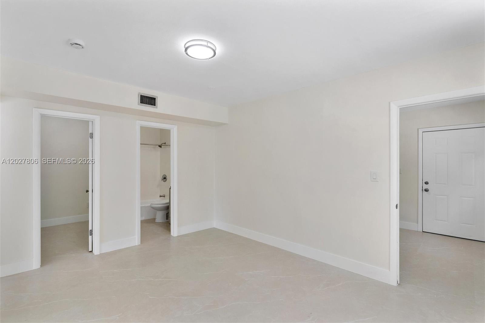 1612 Southwest 23rd Street, Unit 1612 Miami, FL 33145 - Photo 24 of 42 a view of an empty room