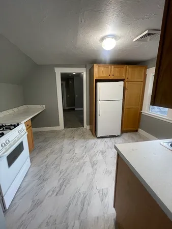 a view of kitchen with washer and dryer