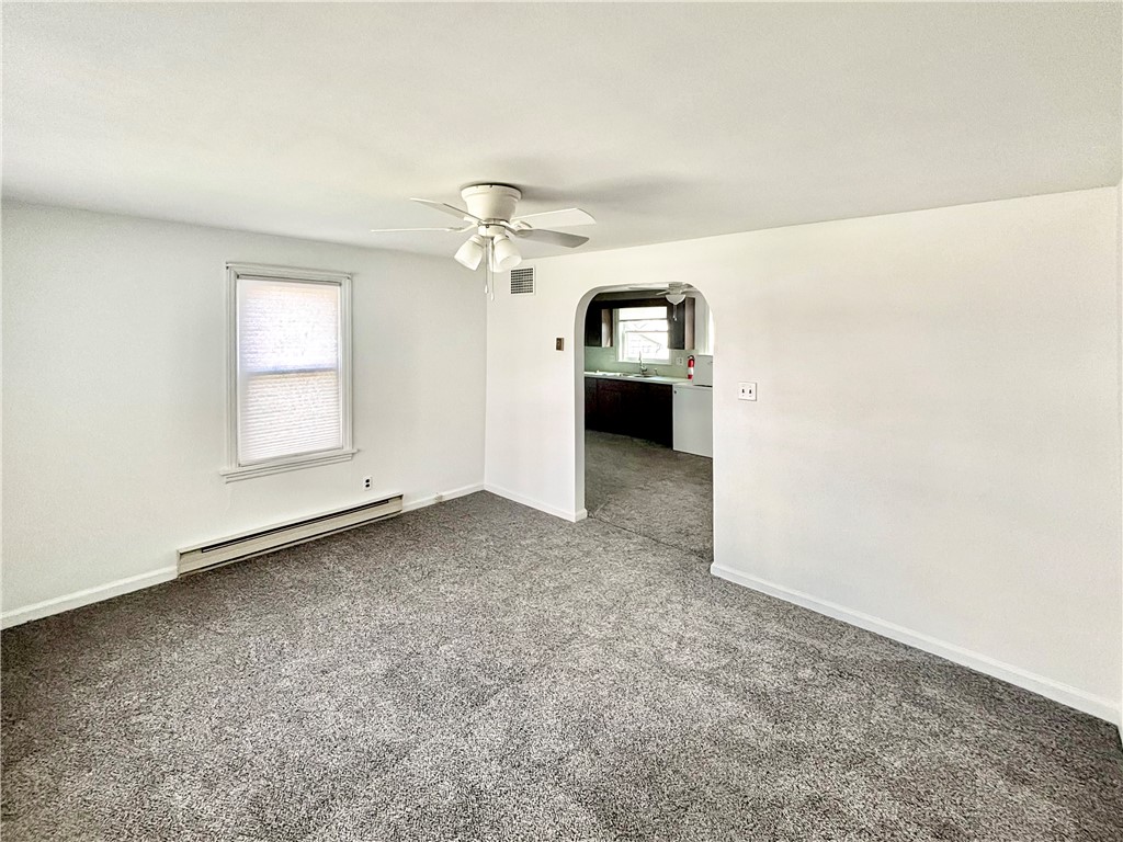 8411 Pitsburg-Laura Road Arcanum, OH 45304 - Photo 2 of 16 This inviting space offers comfort and seamless flow into the adjacent kitchen.