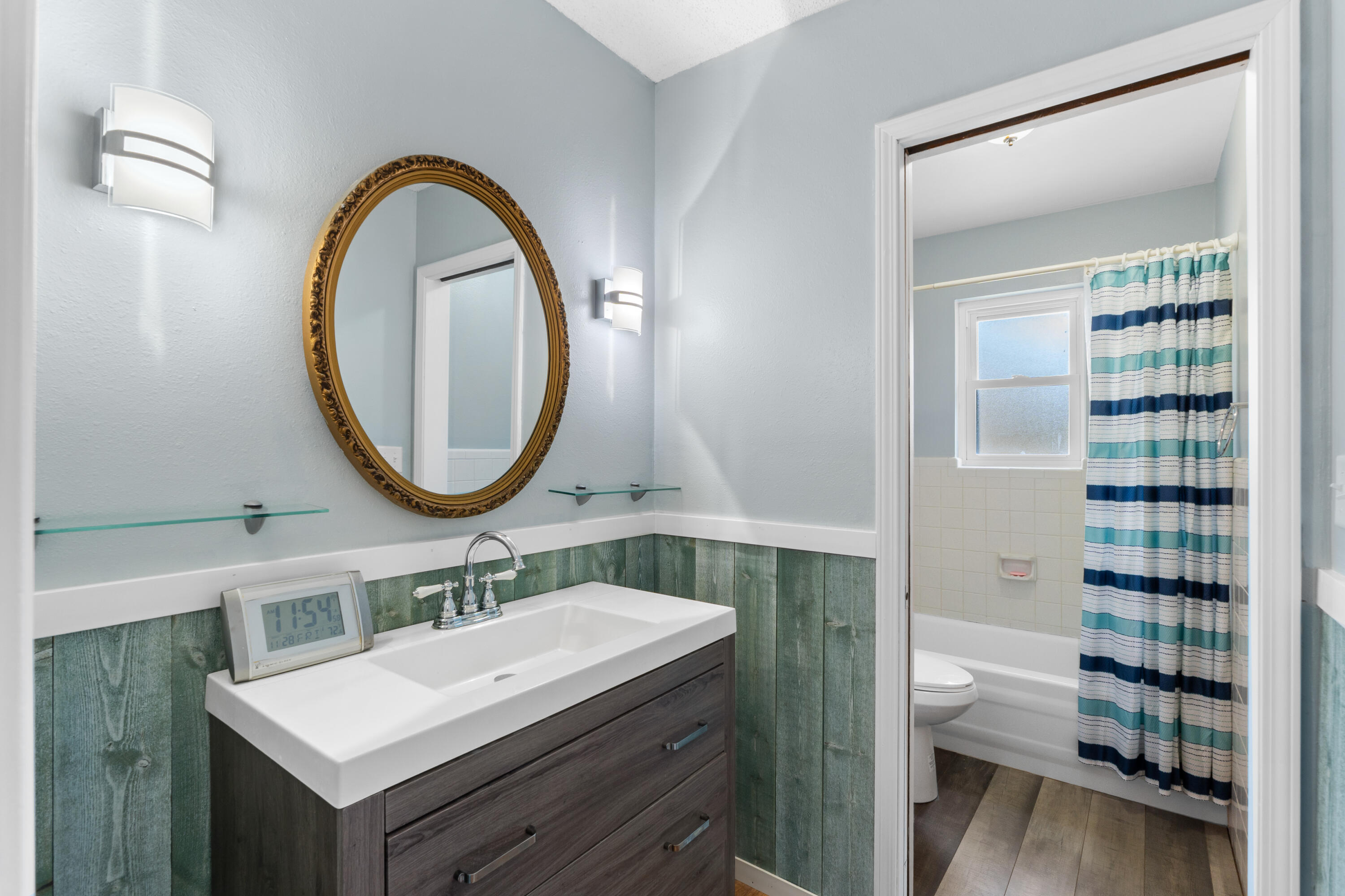 4320 Reinsma Road Milton, FL 32583 - Photo 22 of 41 a bathroom with a sink and a mirror