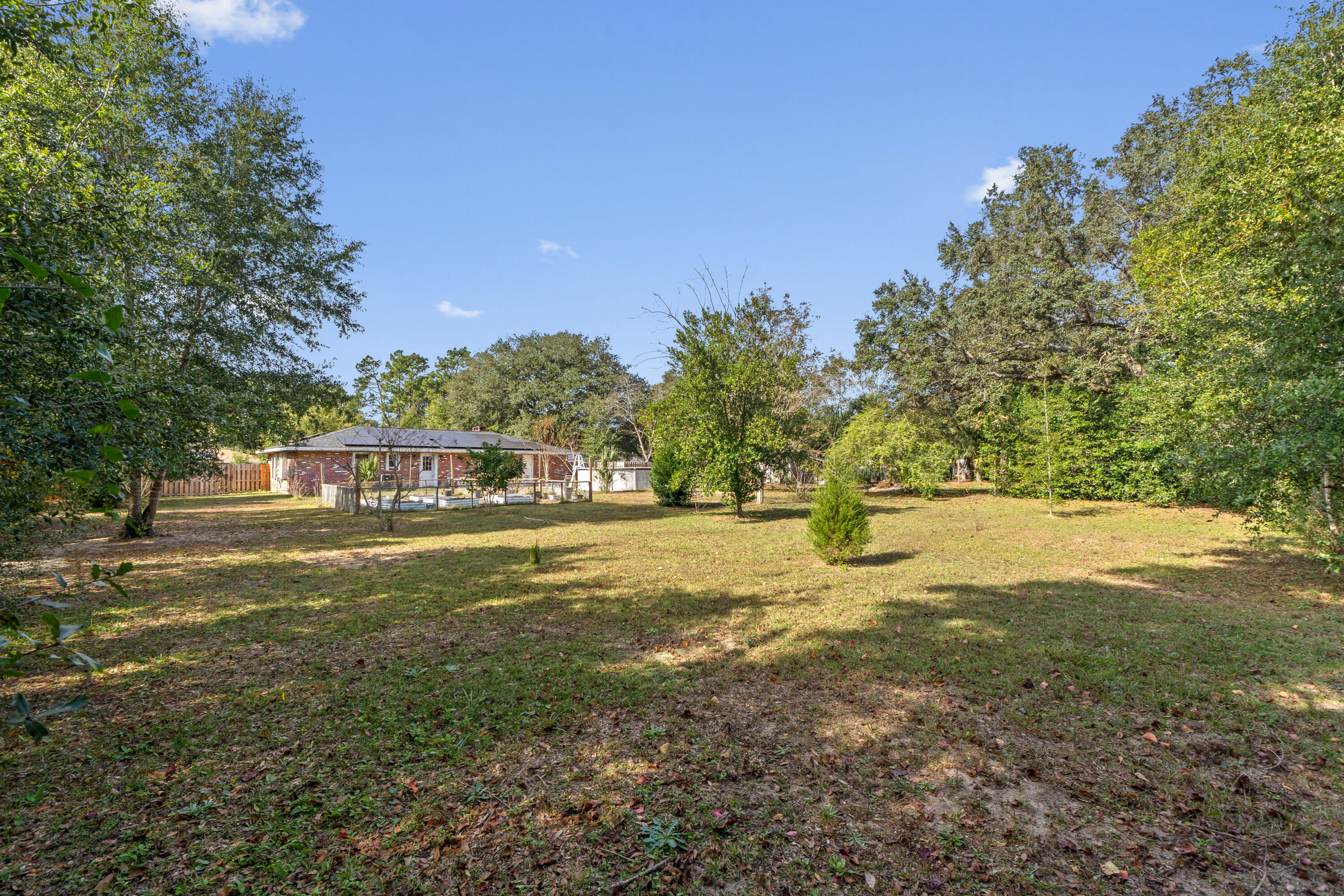 4320 Reinsma Road Milton, FL 32583 - Photo 37 of 41 a view of yard with trees