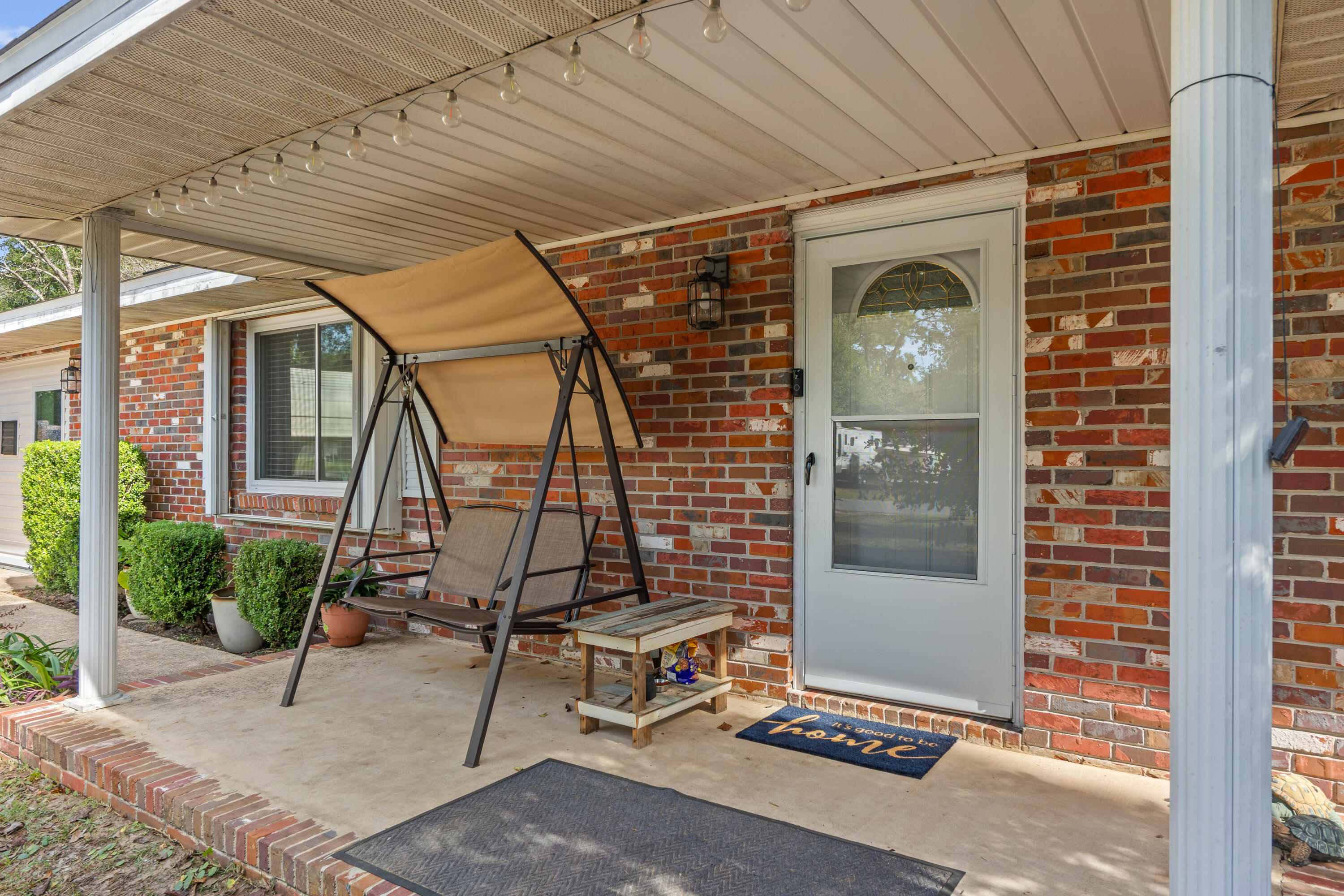 4320 Reinsma Road Milton, FL 32583 - Photo 4 of 41 a view of sitting area with porch and outdoor seating