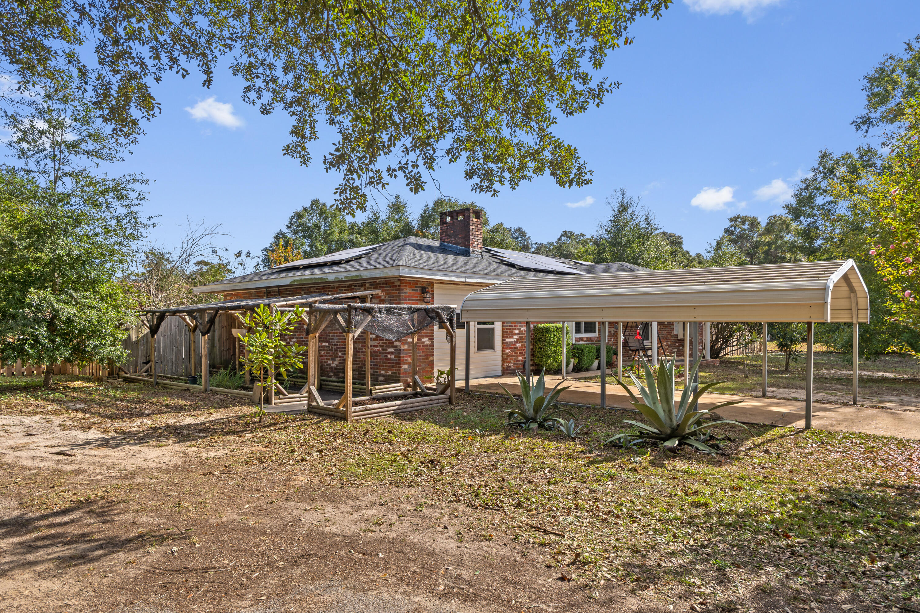4320 Reinsma Road Milton, FL 32583 - Photo 5 of 41 front view of a house with a yard