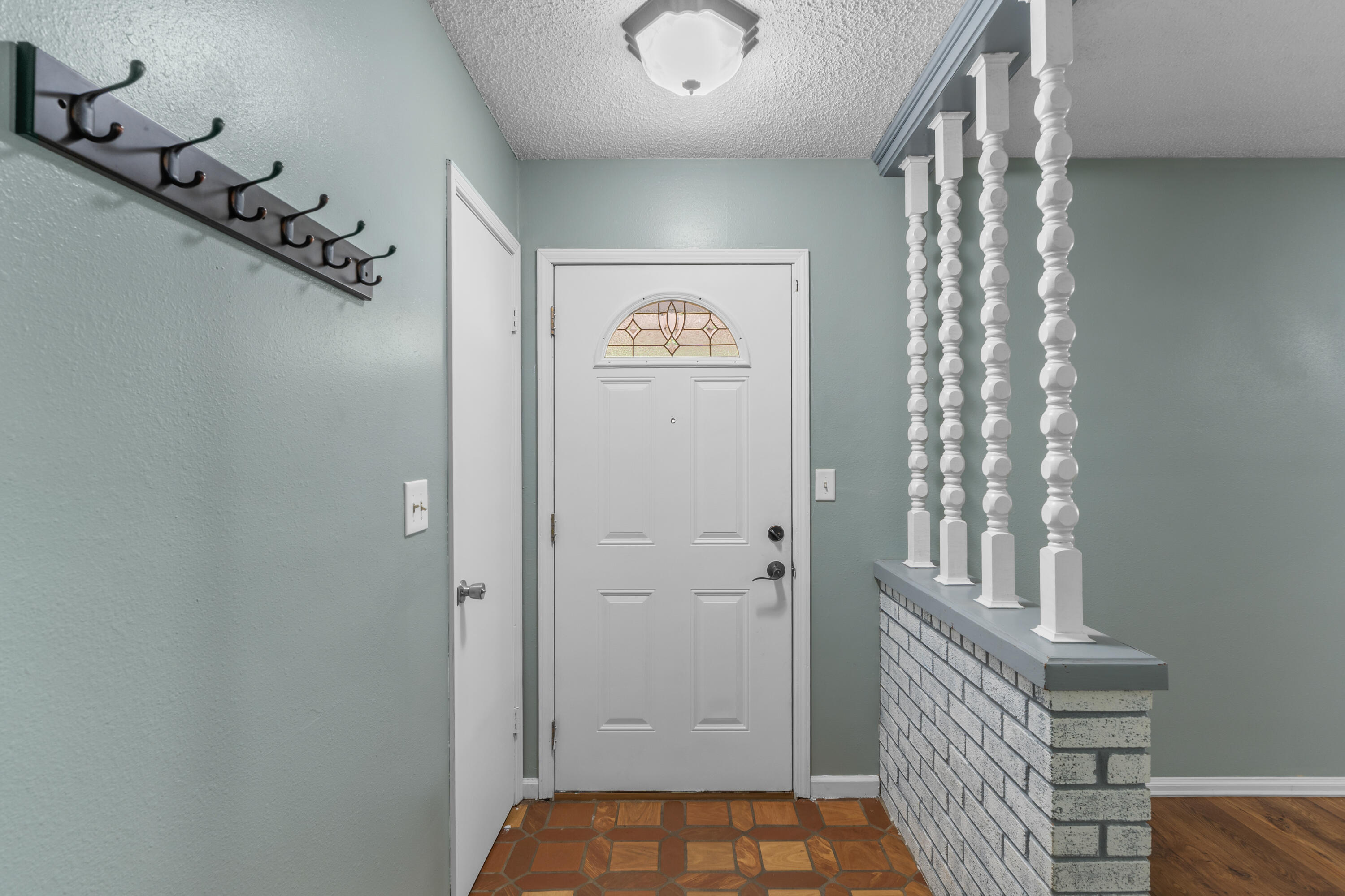 4320 Reinsma Road Milton, FL 32583 - Photo 8 of 41 a view of an entryway with paintings on the wall