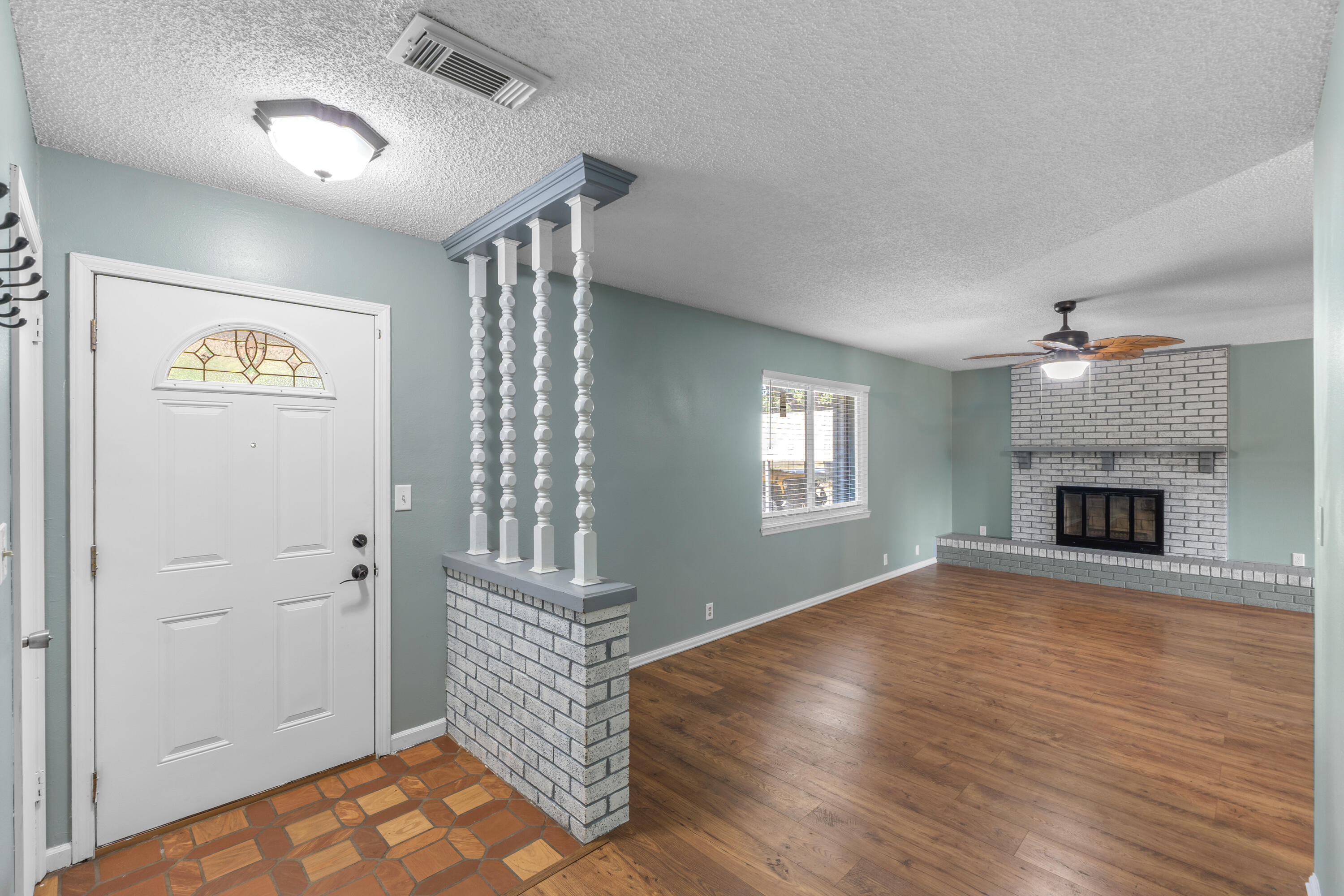 4320 Reinsma Road Milton, FL 32583 - Photo 9 of 41 a view of an empty room with a window and fireplace
