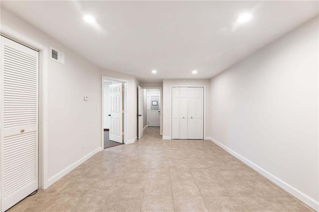 14440 Cogburn Road Alpharetta, GA 30004 - Photo 36 of 62 a view of an empty room