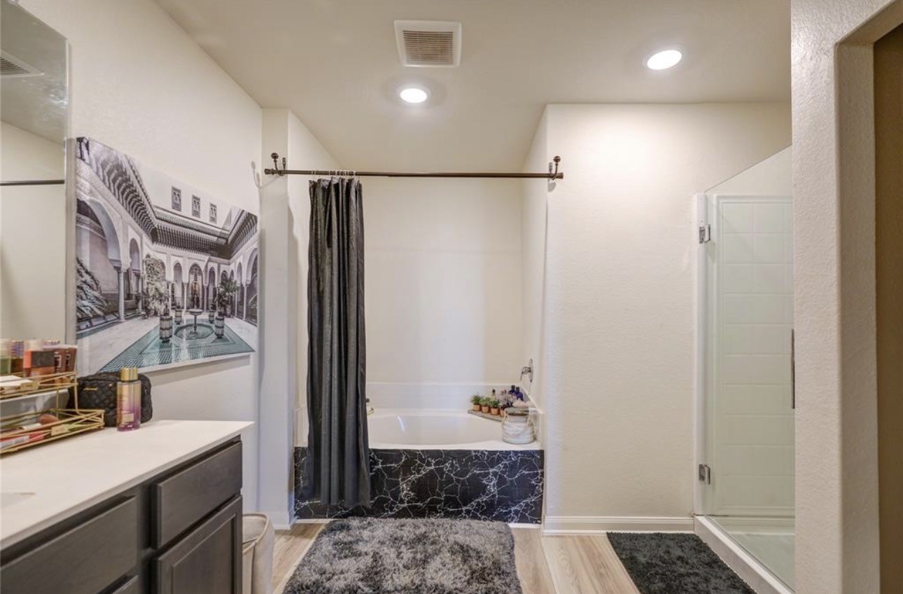 7943 Vacek Meadows Loop Richmond, TX 77469 - Photo 29 of 36 a bathroom with a sink and a mirror