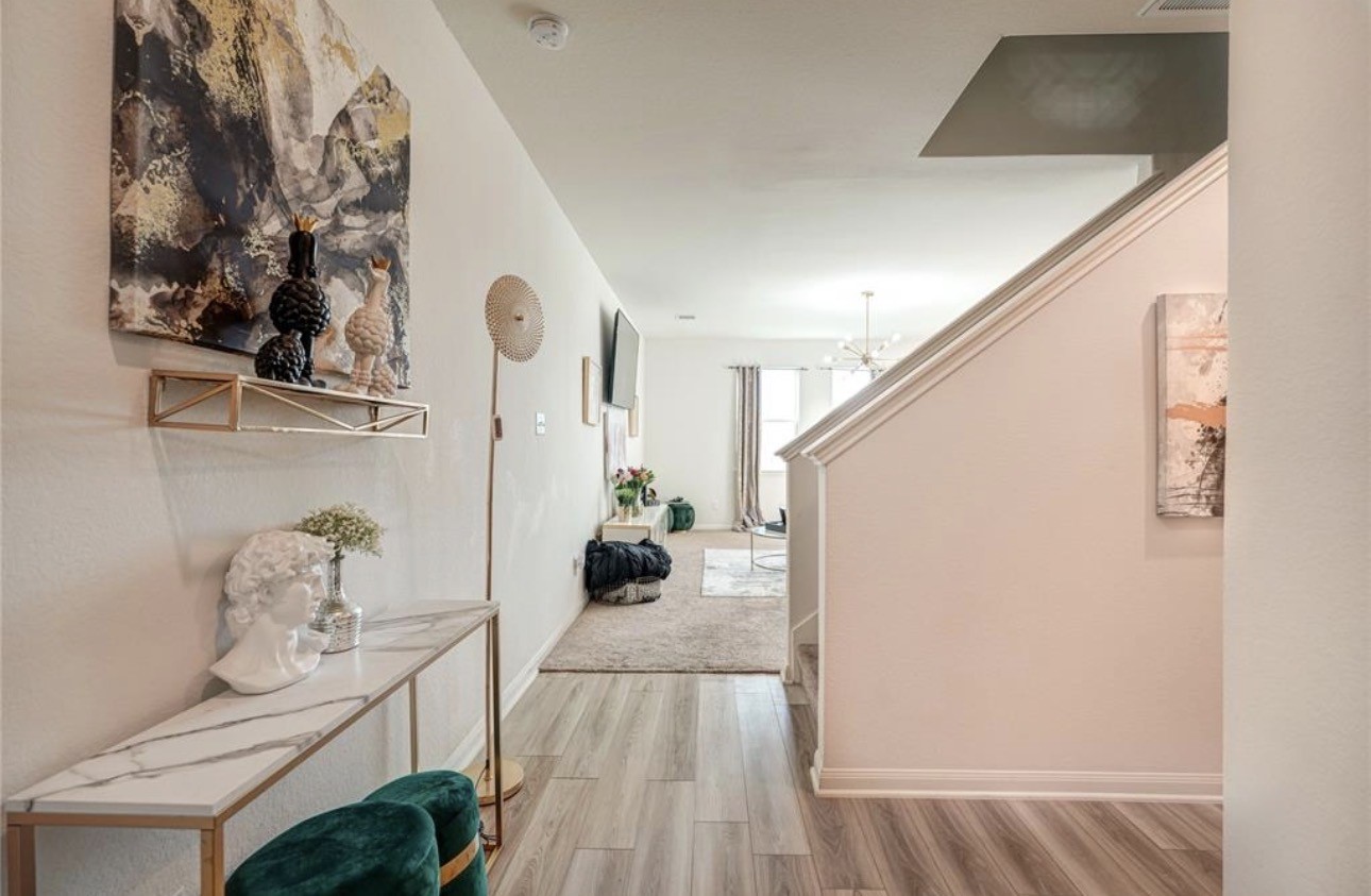 7943 Vacek Meadows Loop Richmond, TX 77469 - Photo 3 of 36 a living room with furniture and wooden floor