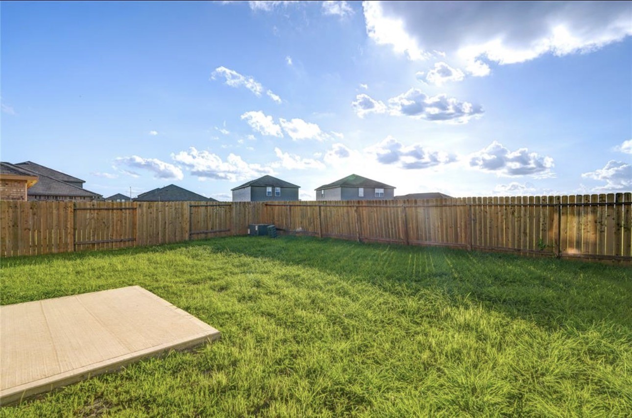 7943 Vacek Meadows Loop Richmond, TX 77469 - Photo 33 of 36 a view of a backyard