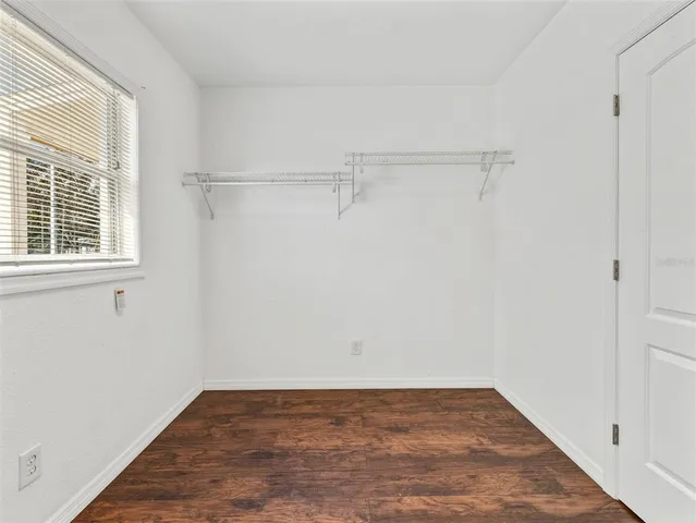 a view of a room with rack on the wall