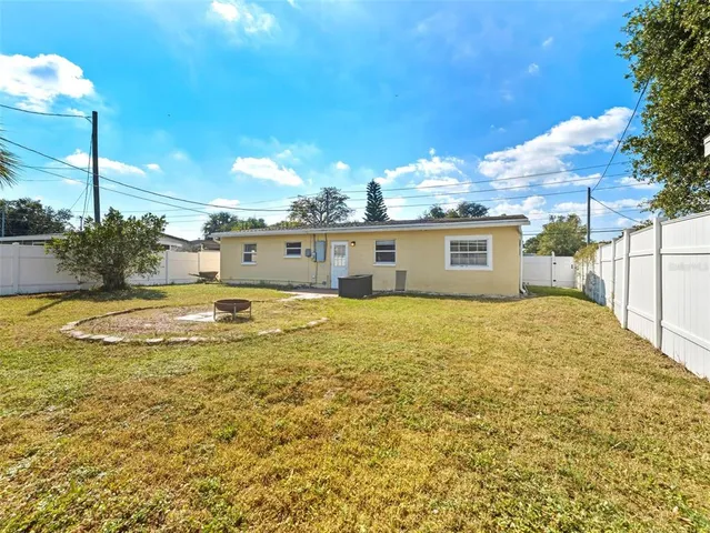 a view of a house with a swimming pool