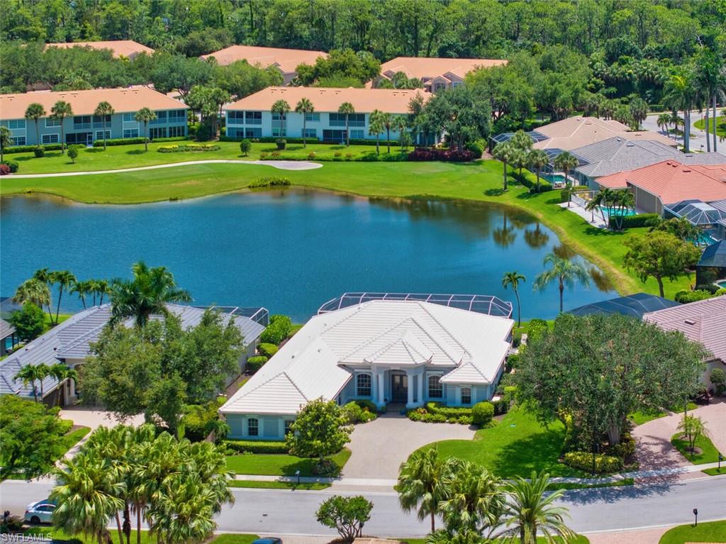 1624 Manchester Court Naples, FL 34109 - Photo 1 of 30 an aerial view of a house with swimming pool yard and outdoor seating