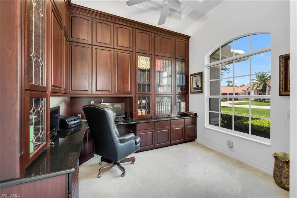 1624 Manchester Court Naples, FL 34109 - Photo 11 of 30 a room with furniture and a window
