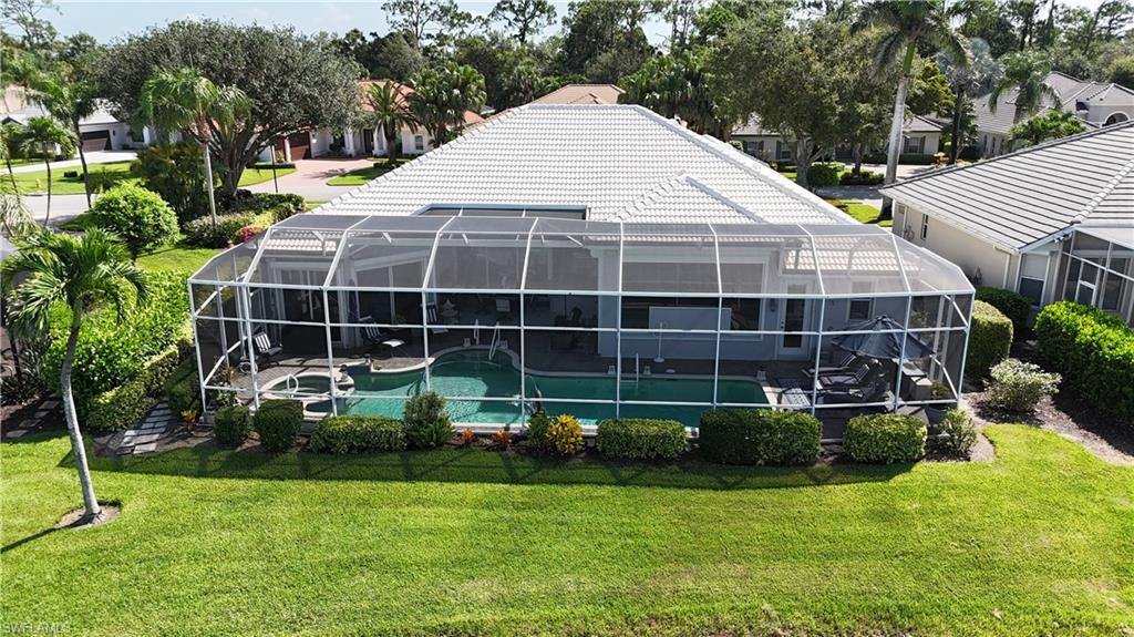 1624 Manchester Court Naples, FL 34109 - Photo 13 of 30 a view of a house with backyard