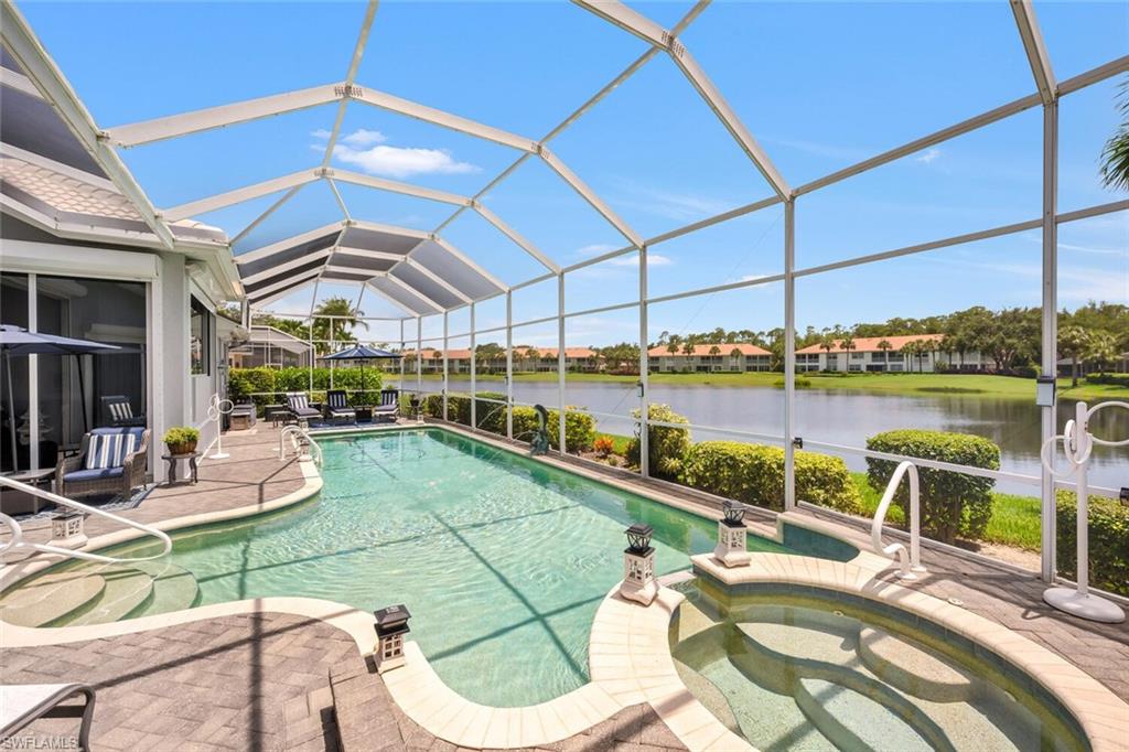 1624 Manchester Court Naples, FL 34109 - Photo 27 of 30 a view of a patio with swimming pool