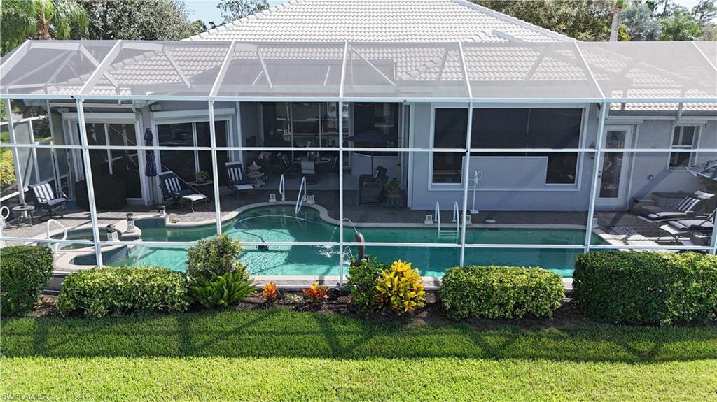 1624 Manchester Court Naples, FL 34109 - Photo 28 of 30 a house view with a garden space