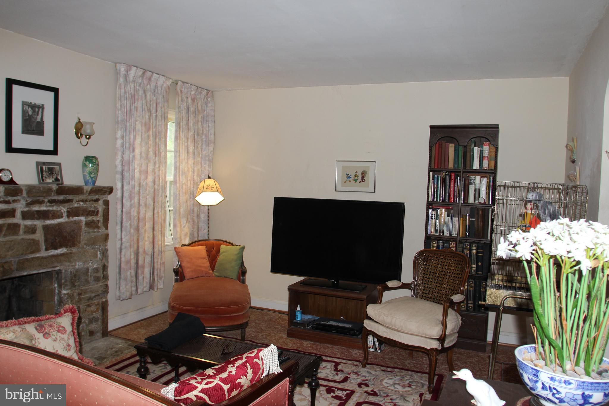 1918 Hillcrest Road Baltimore, MD 21207 - Photo 7 of 18 Living Room with Hardwood Floors