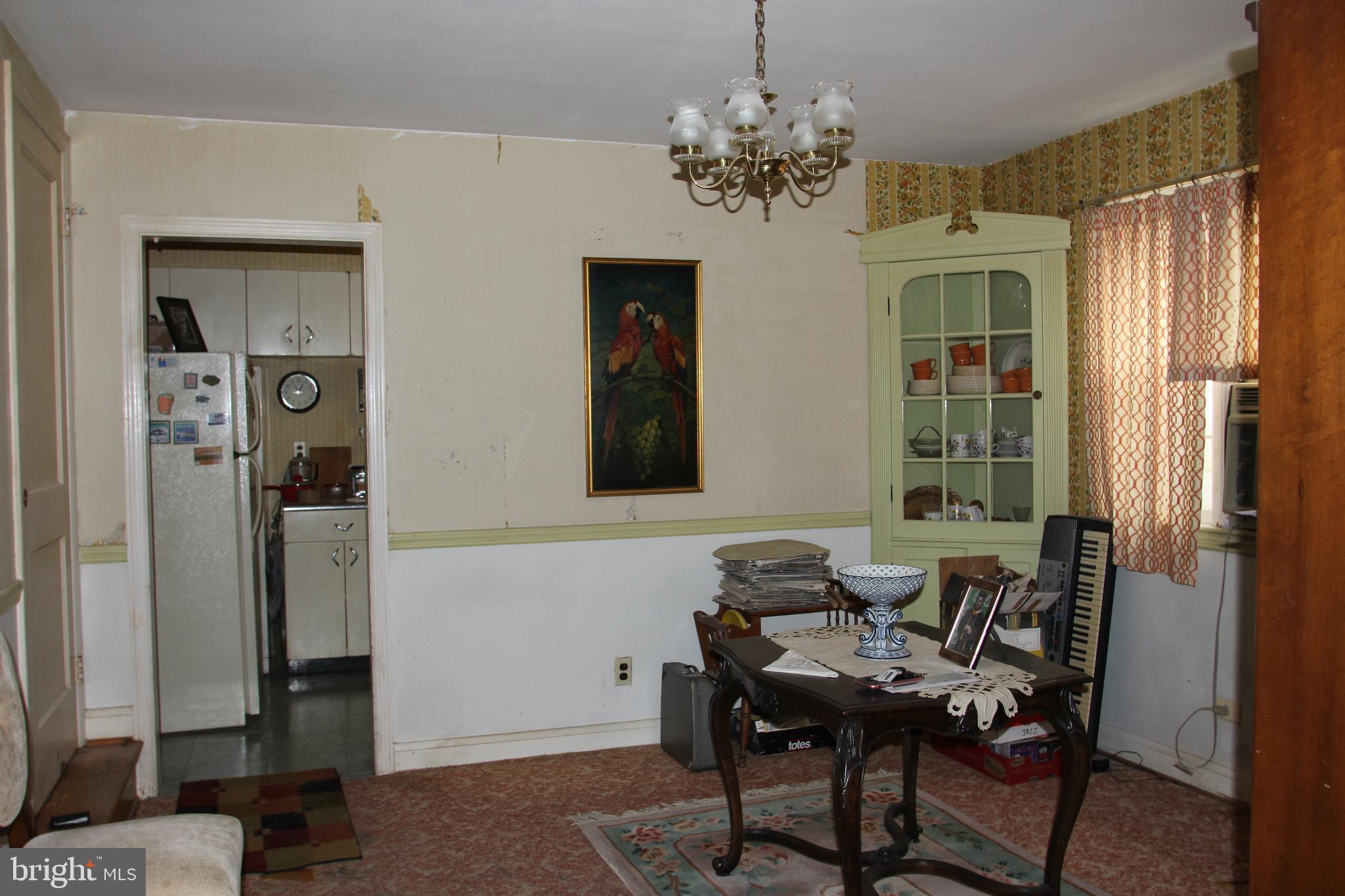 1918 Hillcrest Road Baltimore, MD 21207 - Photo 9 of 18 Dining Room with Built shelves