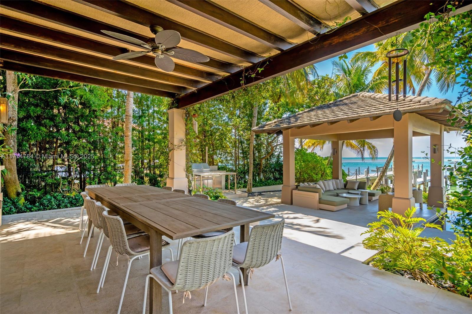 9 Harbor Point Key Biscayne, FL 33149 - Photo 16 of 88 a view of patio with a table chairs and a table