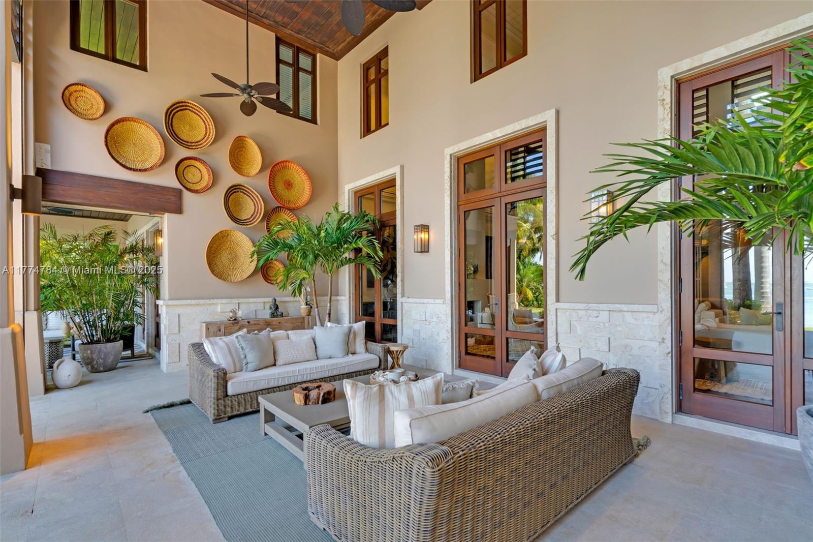 9 Harbor Point Key Biscayne, FL 33149 - Photo 17 of 88 a living room with furniture and a potted plant