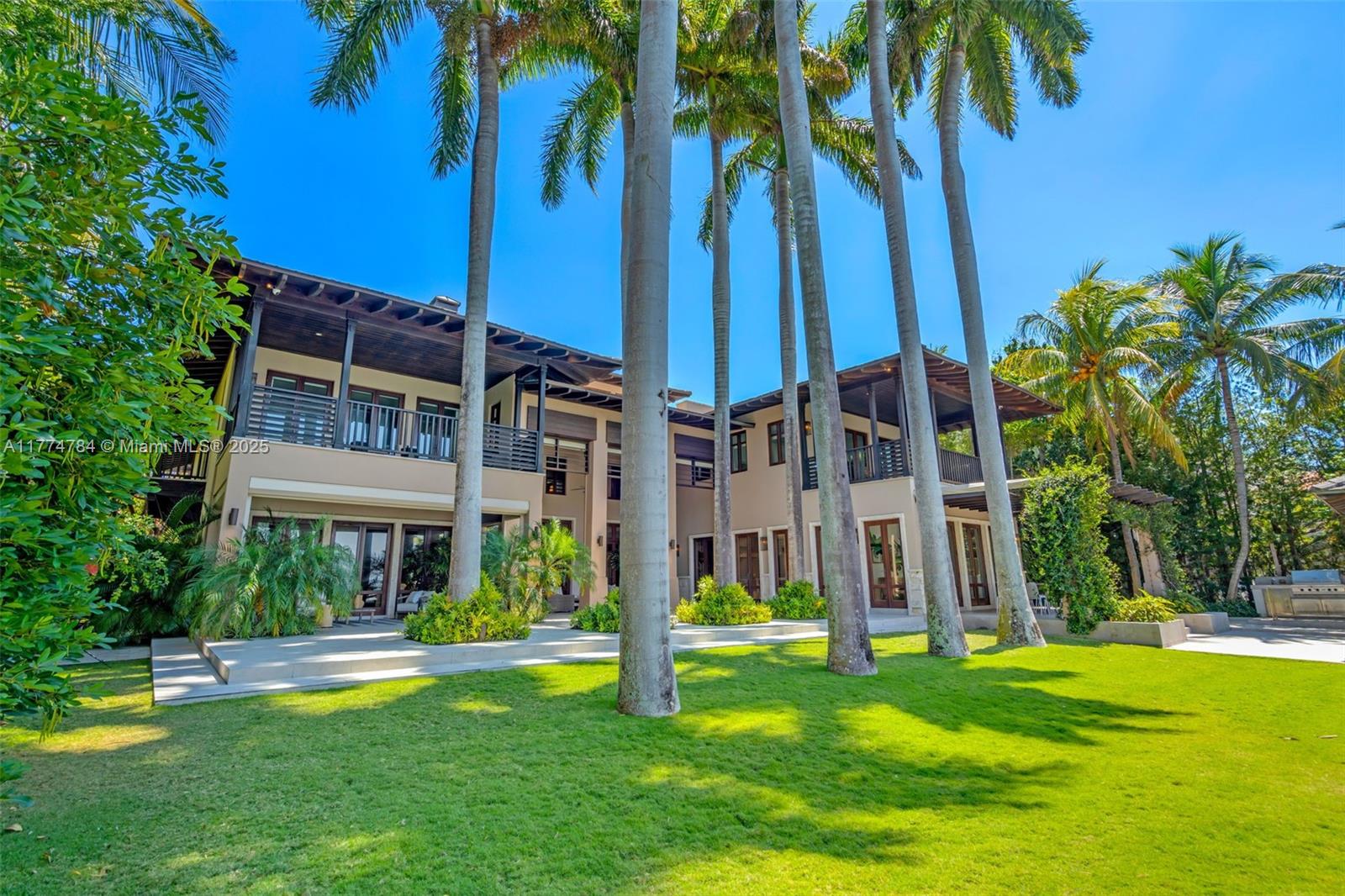 9 Harbor Point Key Biscayne, FL 33149 - Photo 28 of 88 a view of a building with a swimming pool