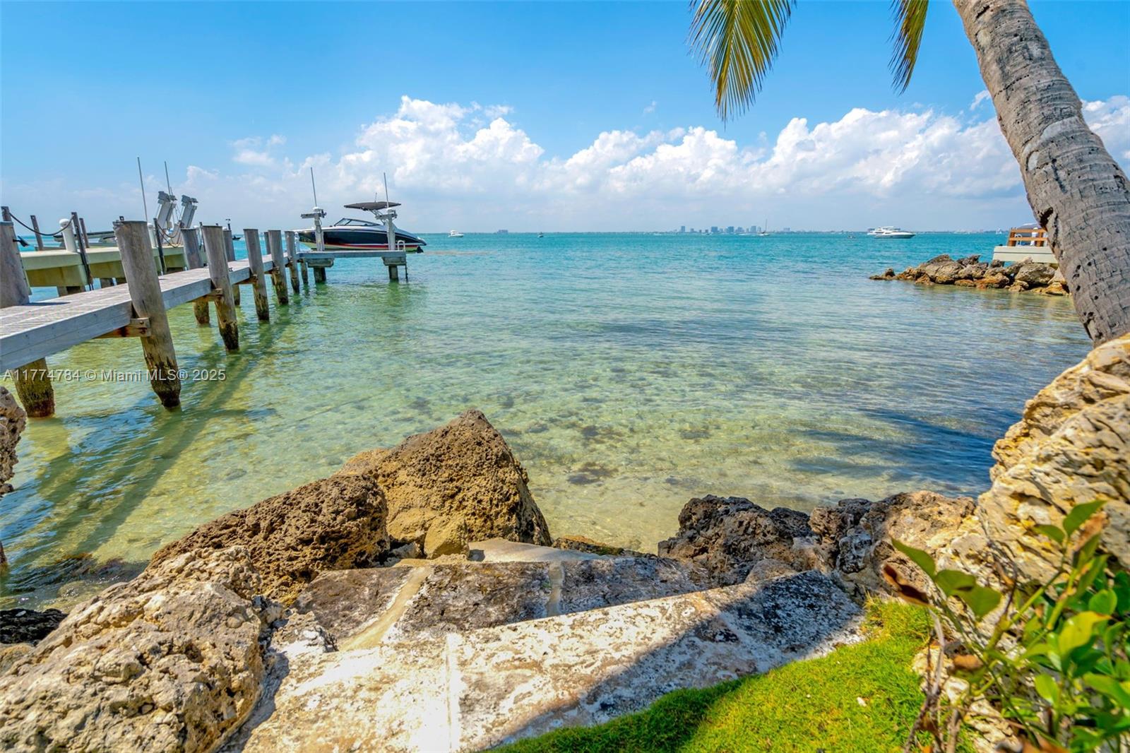 9 Harbor Point Key Biscayne, FL 33149 - Photo 4 of 88 a view of a lake with a yard