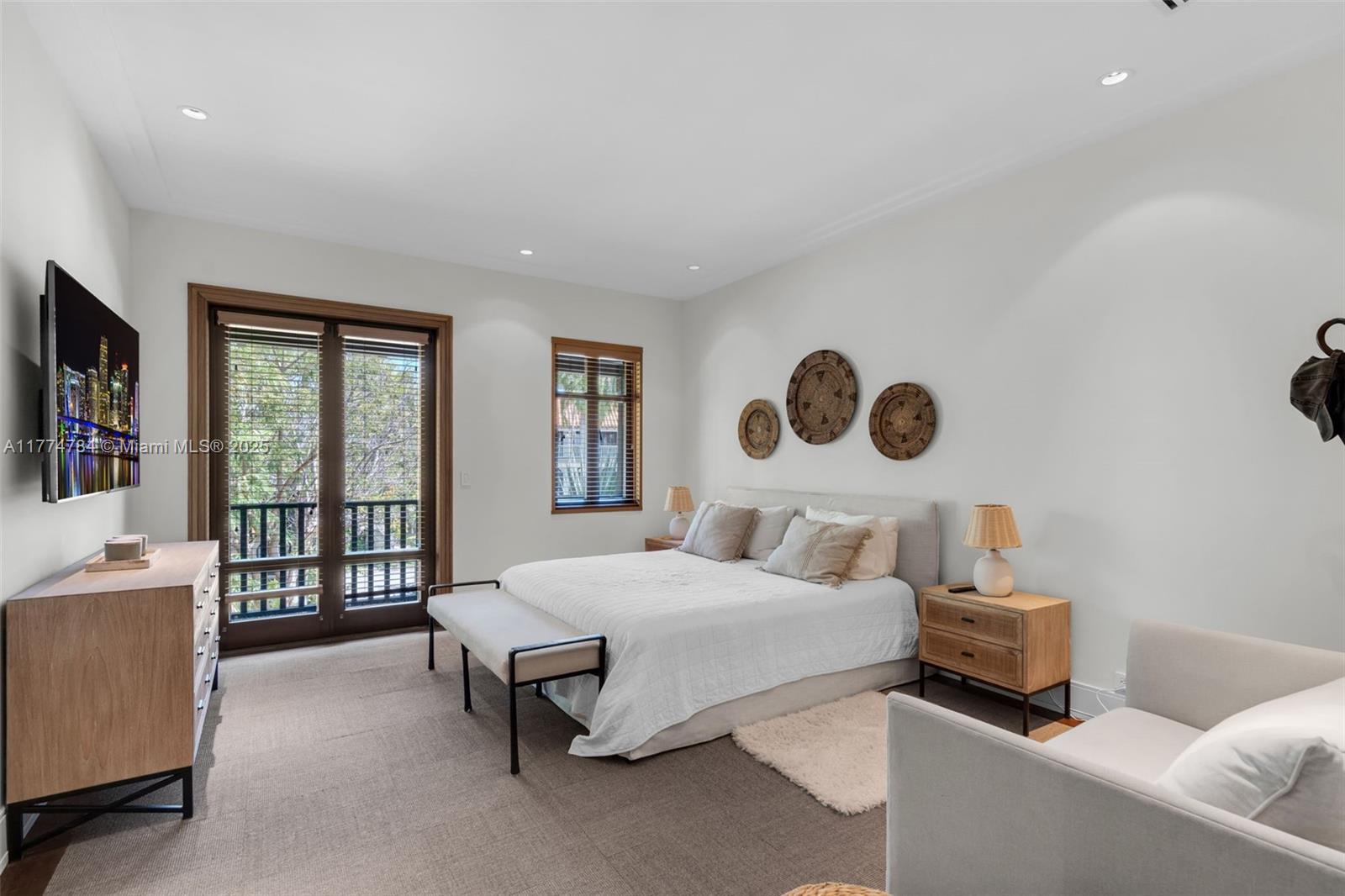 9 Harbor Point Key Biscayne, FL 33149 - Photo 52 of 88 a bedroom with a bed and a large window