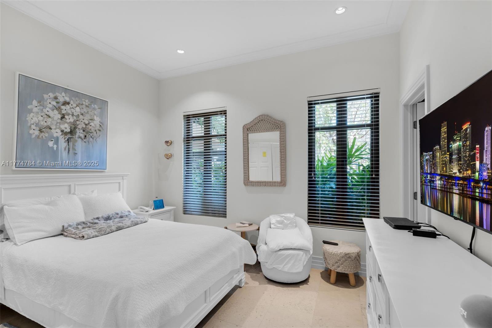 9 Harbor Point Key Biscayne, FL 33149 - Photo 56 of 88 a bedroom with furniture and large windows