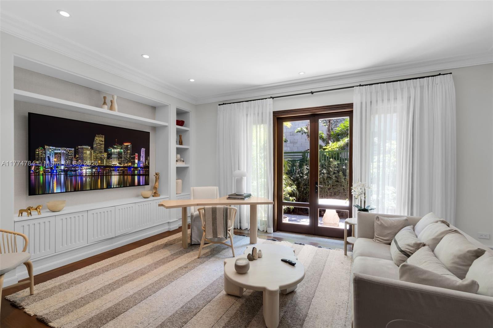 9 Harbor Point Key Biscayne, FL 33149 - Photo 58 of 88 a living room with furniture and a window