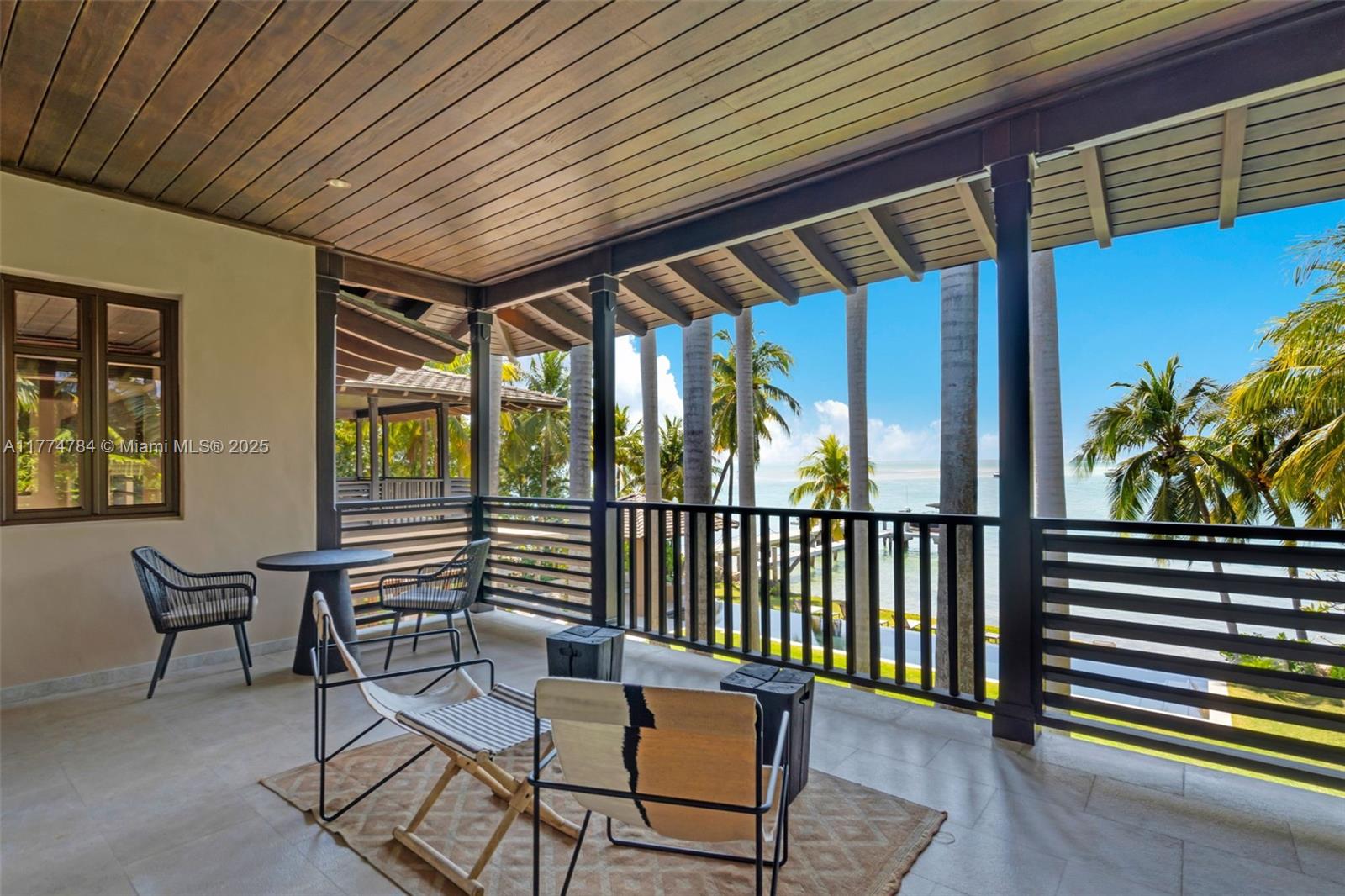 9 Harbor Point Key Biscayne, FL 33149 - Photo 67 of 88 a view of a chairs and table in the balcony