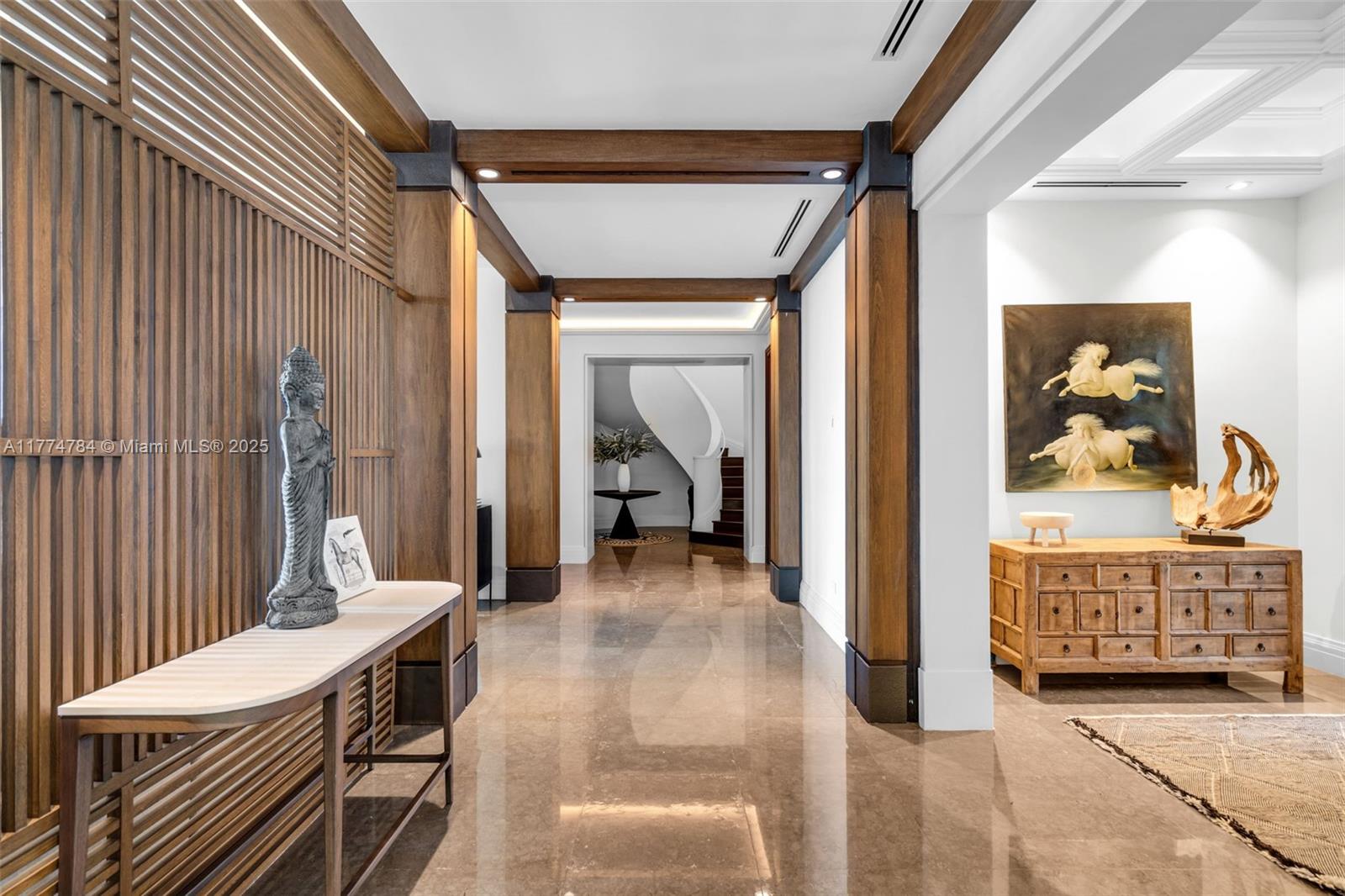 9 Harbor Point Key Biscayne, FL 33149 - Photo 73 of 88 a view of a hallway with furniture and wooden floor