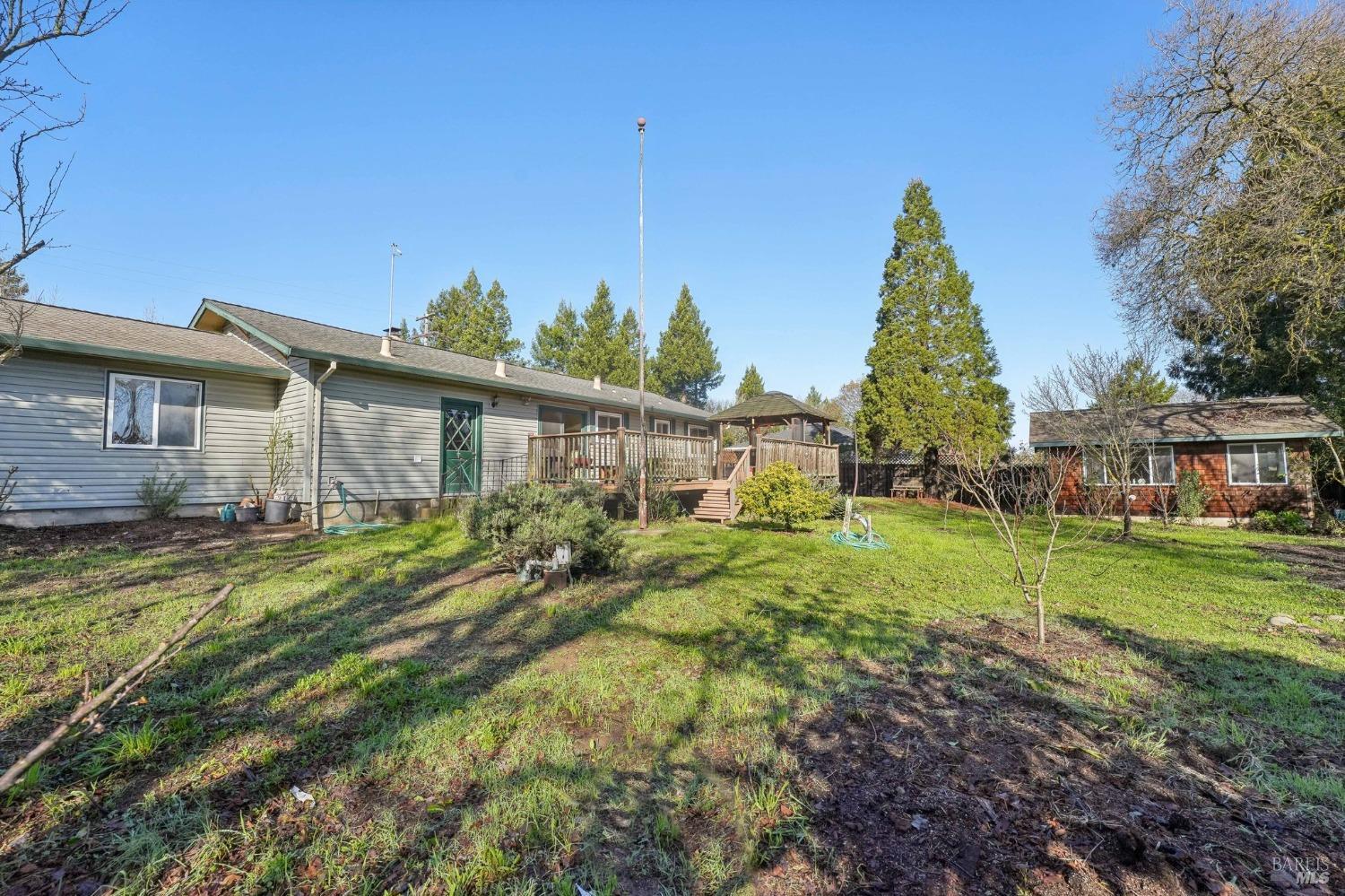 5288 McFarlane Road Sebastopol, CA 95472 - Photo 1 of 1 a view of a house with backyard and sitting area