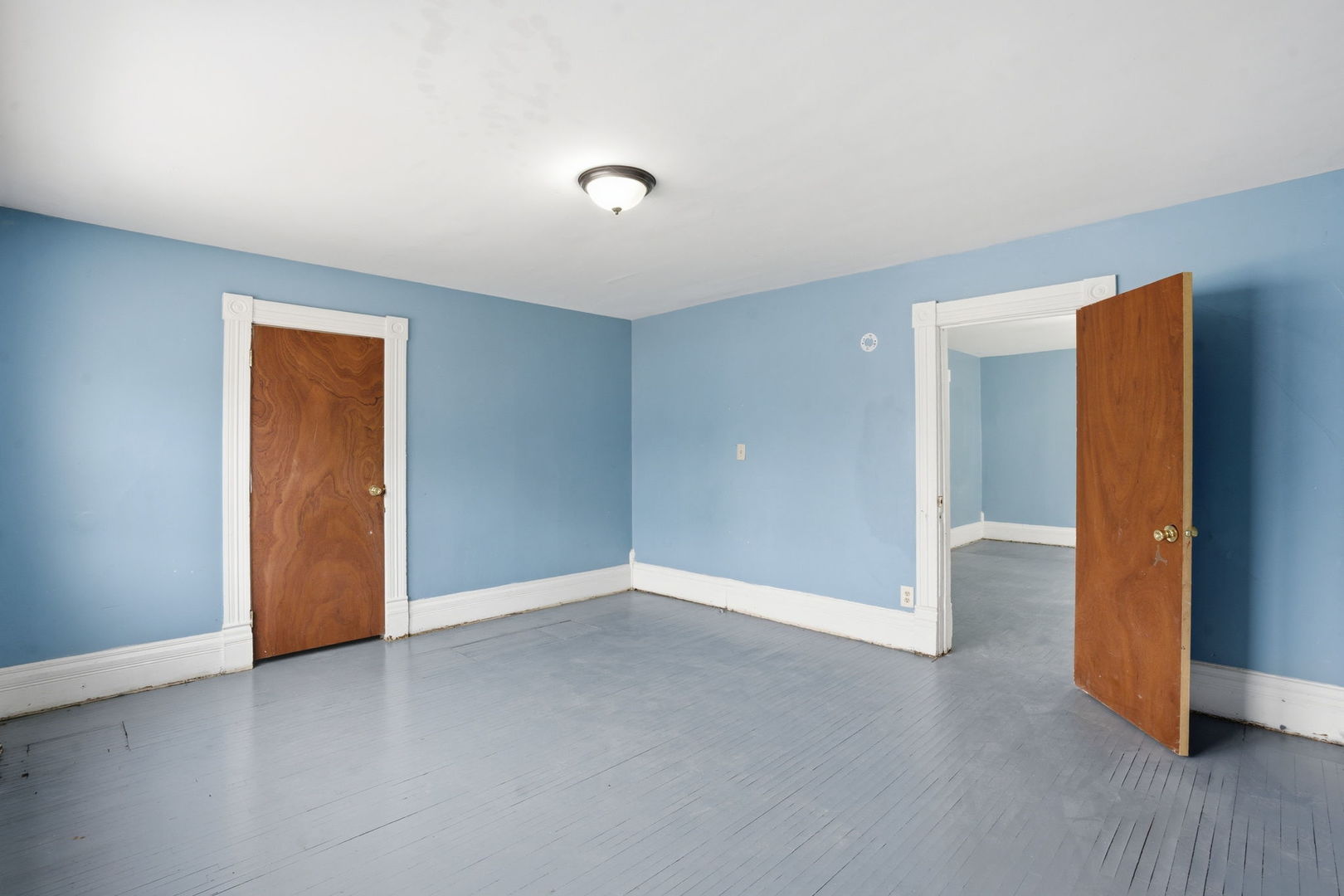 903 44th Street Rock Island, IL 61201 - Photo 13 of 28 a view of an empty room with wooden floor and closet