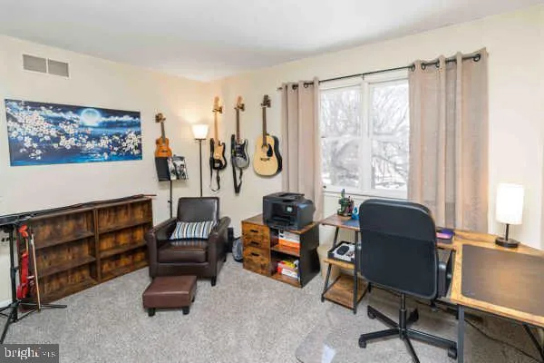 a view of backyard with green space