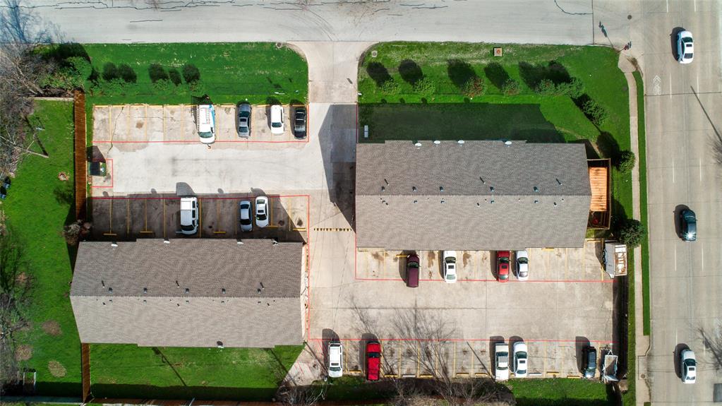 106 East Cedar Street, Unit 12 Arlington, TX 76011 - Photo 1 of 18 an aerial view of a house with a yard