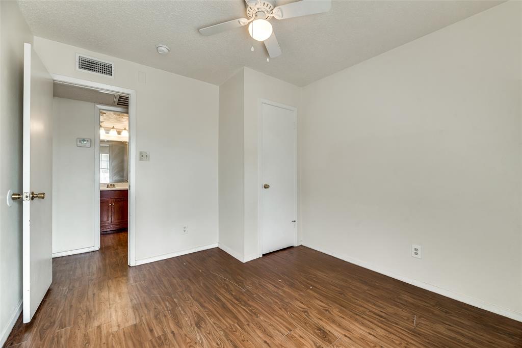 106 East Cedar Street, Unit 12 Arlington, TX 76011 - Photo 15 of 18 wooden floor in an empty room