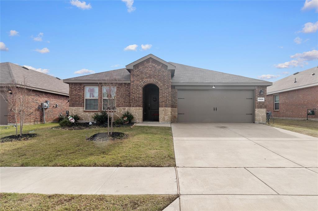 2928 Roper Street Royse City, TX 75189 - Photo 2 of 26 a view of a house with a yard
