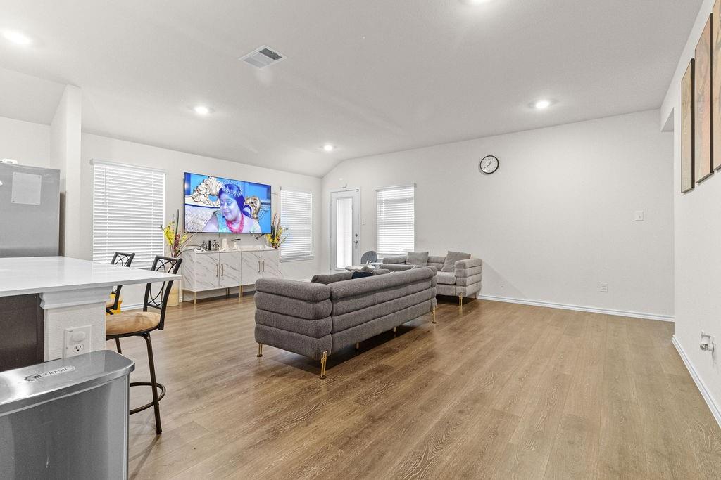 2928 Roper Street Royse City, TX 75189 - Photo 8 of 26 a living room with furniture and a flat screen tv