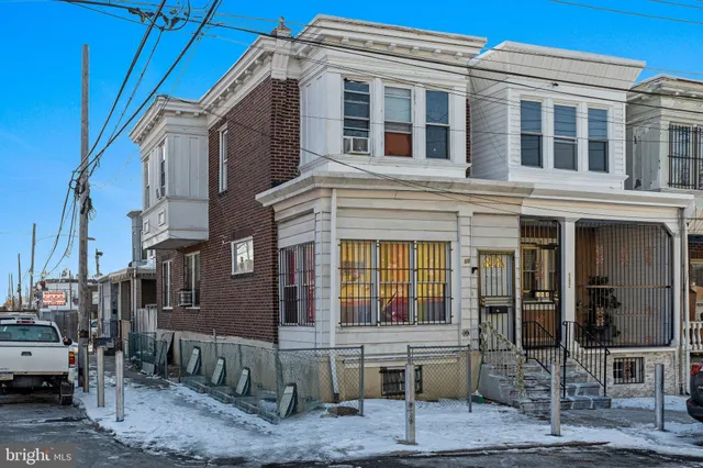a front view of a building with glass windows