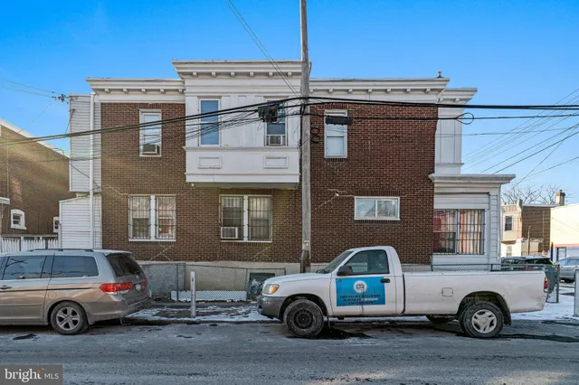 a car parked in front of a house