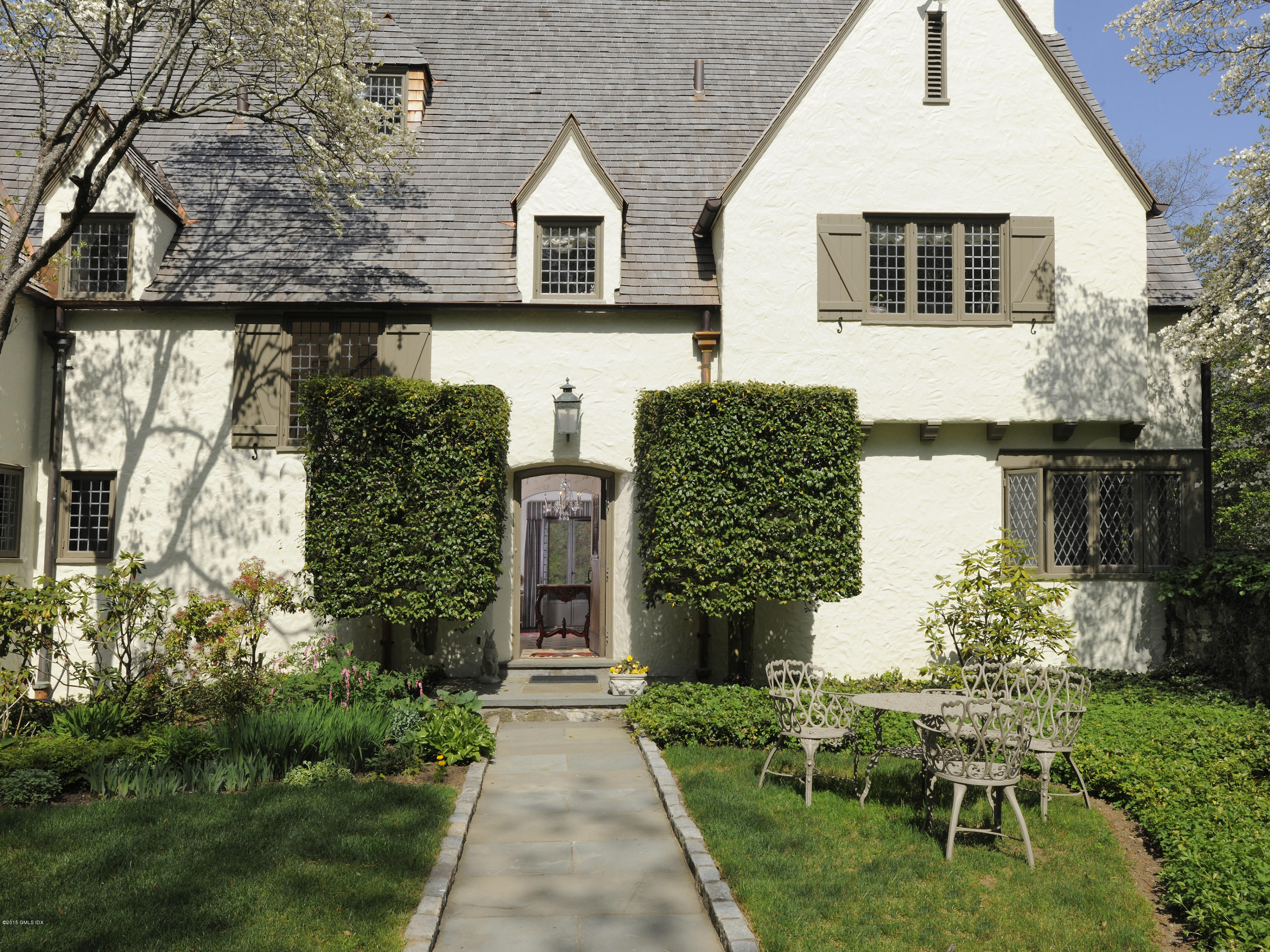 9 Frost Road Greenwich, CT 06830 - Photo 3 of 29 a aerial view of a house with swimming pool and sitting area