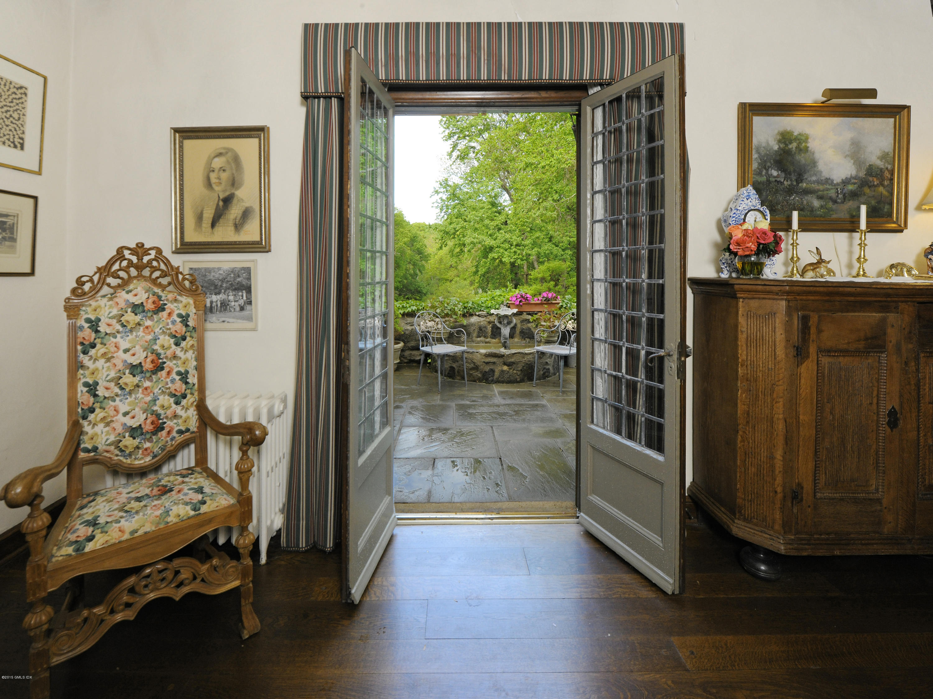 9 Frost Road Greenwich, CT 06830 - Photo 6 of 29 a room with furniture and a window